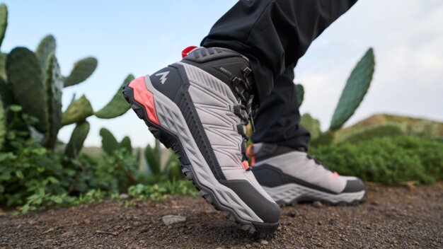 Hiking boot on a rocky path.