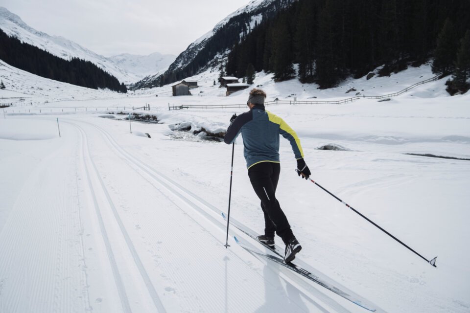 © INTERSPORT International Corporation GmbH Langläufer in verschneiter Berglandschaft. | © INTERSPORT International Corporation GmbH