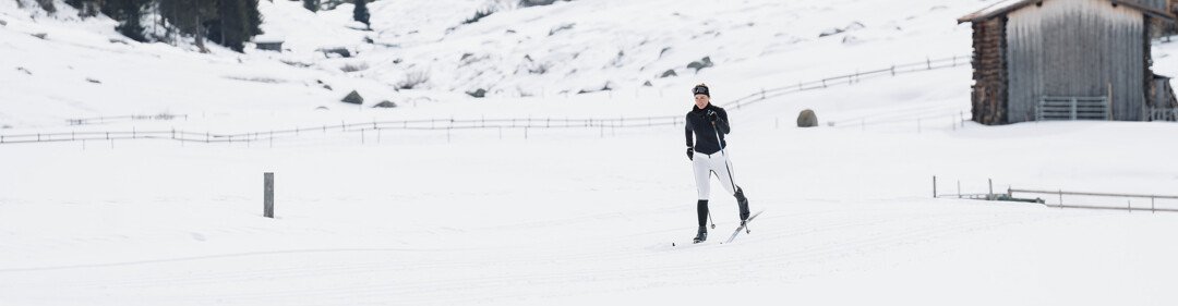 Langläuferin in verschneiter Landschaft | © INTERSPORT International Corporation GmbH