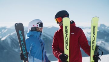 © INTERSPORT International Corporation GmbH Due sciatori con gli sci nella neve. | © INTERSPORT International Corporation GmbH